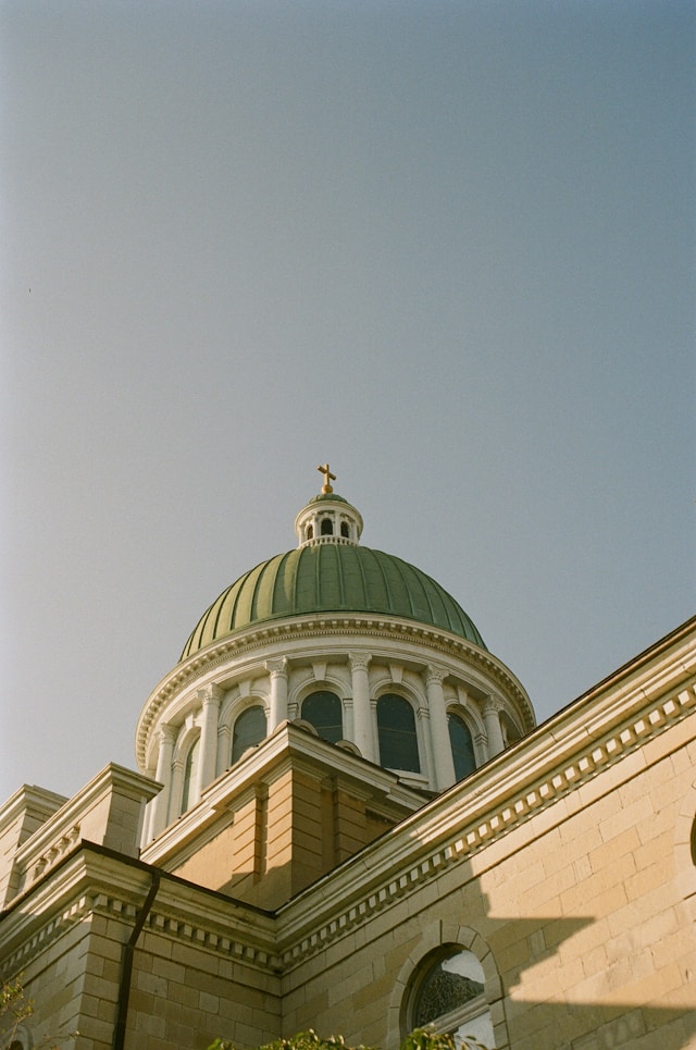 view from below of building with a dome